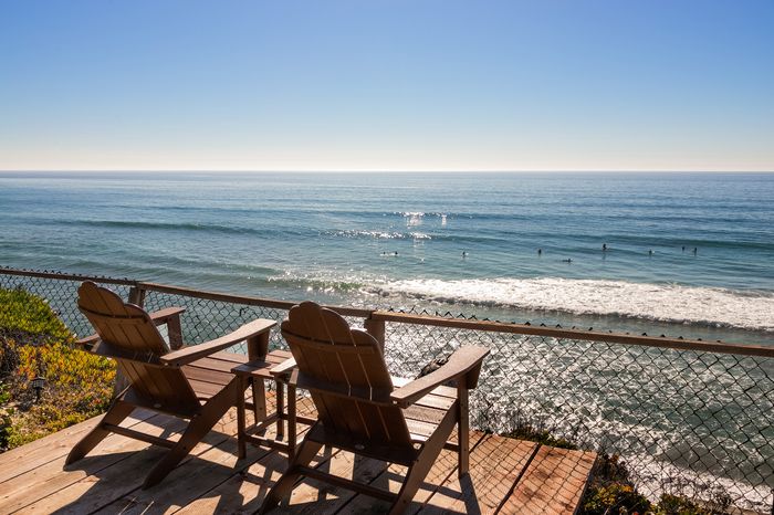 Bluff view with surfers